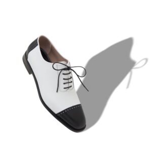 MANOLO Scarpe stringate in pelle di vitello bianca e nera